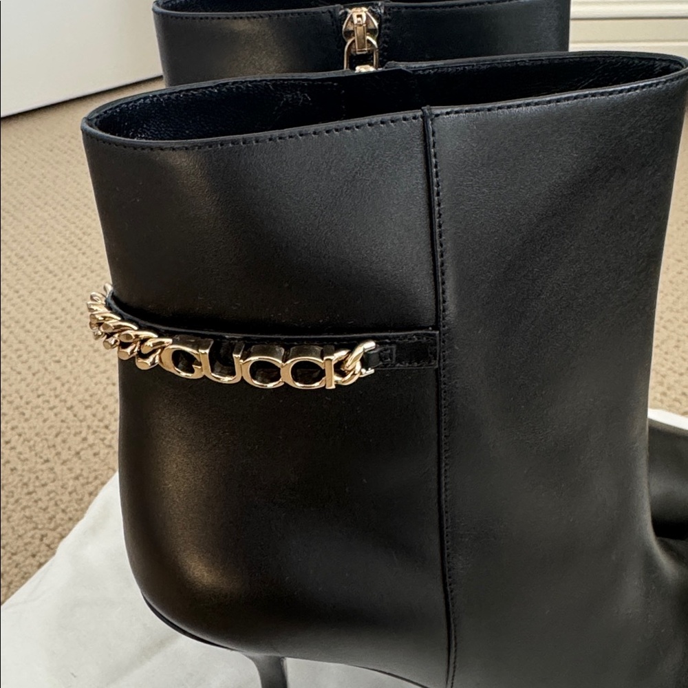 NIB-Gucci Black Heeled Boots with Gold Chain
Size 41 - Picture 4 of 10